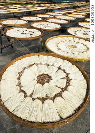 Close-up of traditional handmade noodle-making drying outdoors in Guanmiao, Tainan, Taiwan. 100359958