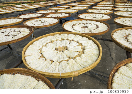 Close-up of traditional handmade noodle-making drying outdoors in Guanmiao, Tainan, Taiwan. 100359959