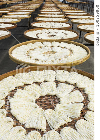 Close-up of traditional handmade noodle-making drying outdoors in Guanmiao, Tainan, Taiwan. 100359960