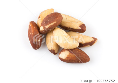Brazil nuts on white close up 100365752