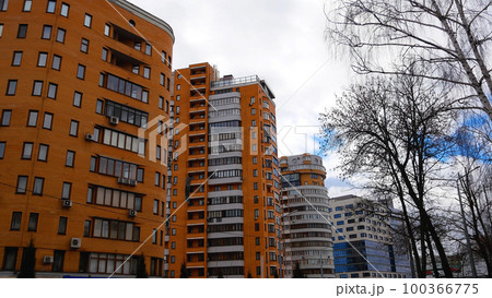A number of multi-storey houses made of red brick. Urban landscape, urbanism A number of multi-storey houses made of red brick. Urban landscape, urbanism 100366775