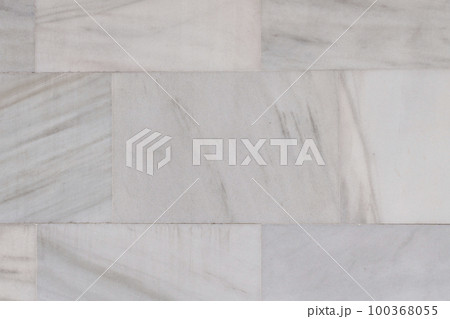 Marble gray block wall background closeup Marble gray block wall background closeup 100368055