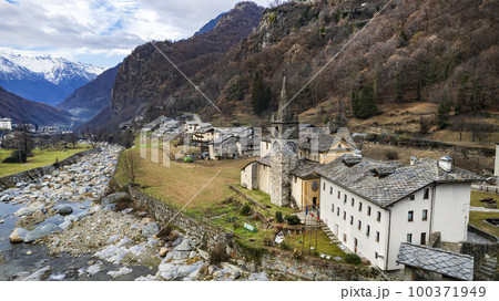 most beautiful Alpine villages of northern Italy- Lillianes, medieval borgo in Valle d'Aosta region, aerial drone view. most beautiful Alpine villages of northern Italy- Lillianes, medieval borgo in Valle d'Aosta region, aerial drone view. 100371949