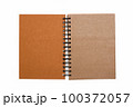 Notebook, with place for your image, text or corporate identity details. Spiral notepad on a table. 100372057