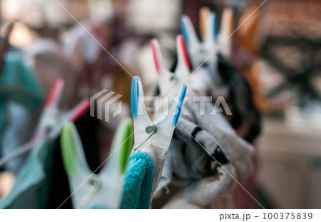 Laundry pins on ropes at home Laundry pins on ropes at home 100375839