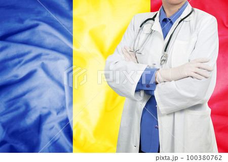 Doctor standing with the flag Doctor standing with the flag 100380762