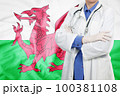 Doctor standing with the flag 100381108