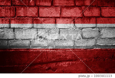 Dark brick wall with the flag Dark brick wall with the flag 100381113