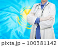 Doctor standing with the flag 100381142