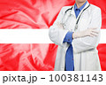 Doctor standing with the flag 100381143