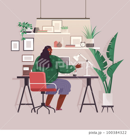 Work at home. Freelancer woman working on laptop computer at her house. Online study, education 100384322