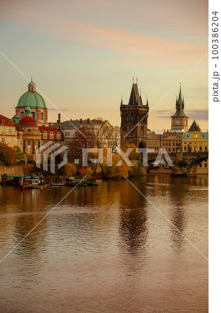 landscape with Vltava river and Charles Bridge 100386204