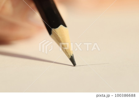 Black pencil drawing line on paper close up, shallow depth of field. Black pencil drawing line on paper close up, shallow depth of field. 100386688
