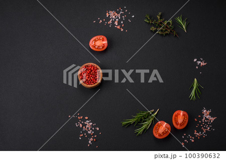 Rosemary, thyme, allspice, salt, cherry tomatoes and other spices and herbs Rosemary, thyme, allspice, salt, cherry tomatoes and other spices and herbs 100390632