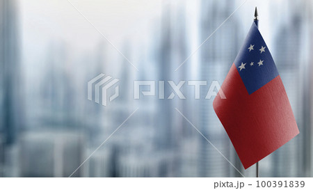 Small flags of the Samoa on an abstract blurry background Small flags of the Samoa on an abstract blurry background 100391839