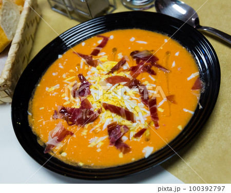 Salmorejo with jamon and boiled egg Salmorejo with jamon and boiled egg 100392797