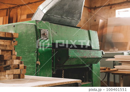 Wood working CNC machine at carpentry workshop Wood working CNC machine at carpentry workshop 100401551