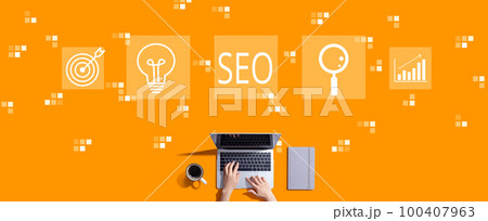 SEO concept with person working with laptop 100407963