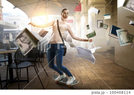 Young woman riding her skateboard Young woman riding her skateboard 100408114