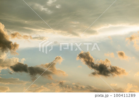 colorful dramatic sky with cloud at sunset. 100411289