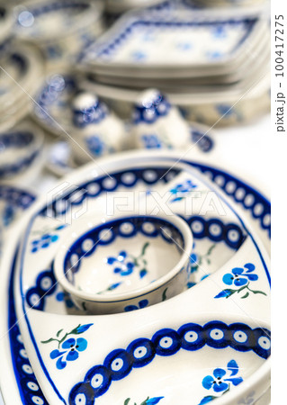 Closeup handmade pottery with blue pattern Closeup handmade pottery with blue pattern 100417275