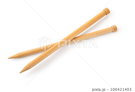 A pair of large wooden knitting needles A pair of large wooden knitting needles 100421403