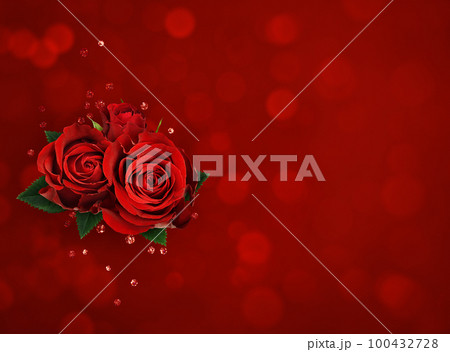 Red rose flowers and confetti in a floral arrangement on holiday background Red rose flowers and confetti in a floral arrangement on holiday background 100432728