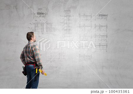 Construction industry concept with drafts and plans 100435361