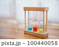 Colorful hourglasses with blurred background cute concept 100440058