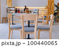 Coffee shops with tables are empty by noon. 100440065