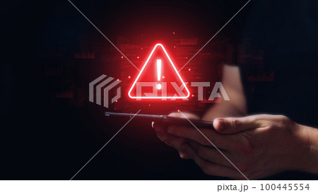 Caution concept. The person is holding a tablet with a sign. 100445554