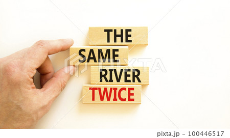 The same river twice symbol. Concept words The same river twice on wooden block. Beautiful white table white background. Motivational business the same river twice concept. Copy space. The same river twice symbol. Concept words The same river twice on wooden block. Beautiful white table white background. Motivational business the same river twice concept. Copy space. 100446517