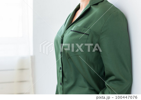 Close-up detail and fabric texture of a pajama. Homewear, sleepwear, shopping and sale 100447076