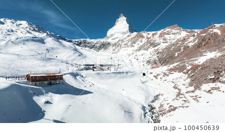 Beautiful Zermatt ski resort with view of the Matterhorn peak on the horizon. Beautiful Swiss Alps. Beautiful Zermatt ski resort with view of the Matterhorn peak on the horizon. Beautiful Swiss Alps. 100450639