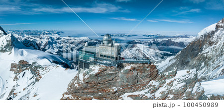 Aerial panorama view of the Sphinx Observatory on Jungfraujoch - Top of Europe, one of the highest observatories in the world located at the Jungfrau railway station, Bernese Oberland, Switzerland. Aerial panorama view of the Sphinx Observatory on Jungfraujoch - Top of Europe, one of the highest observatories in the world located at the Jungfrau railway station, Bernese Oberland, Switzerland. 100450989