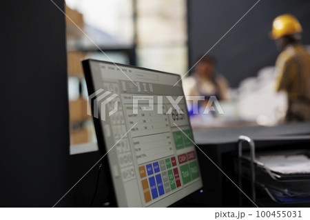 Pick ticket with purchased items on laptop screen in ecommerce store retail warehouse. Online customer order with goods list on computer monitor in shop storehouse storage room close up Pick ticket with purchased items on laptop screen in ecommerce store retail warehouse. Online customer order with goods list on computer monitor in shop storehouse storage room close up 100455031