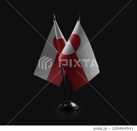 Small national flags of the Greenland on a black background 100464041