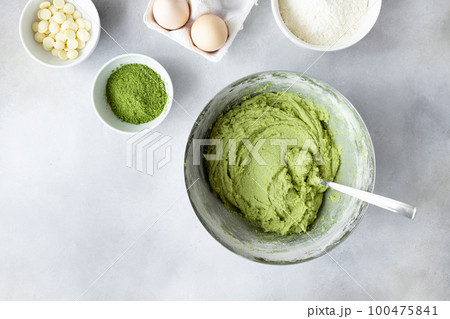 raw dough with matcha green tea in metal bowl raw dough with matcha green tea in metal bowl 100475841