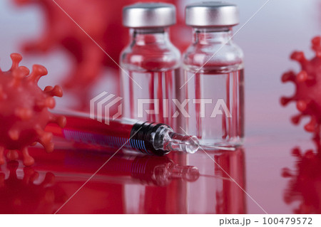 Close up medical syringe with a vaccine 100479572