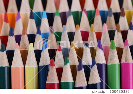 Macro photography of colored pencils. Background of colorful sharpened colored pencils Macro photography of colored pencils. Background of colorful sharpened colored pencils 100480383