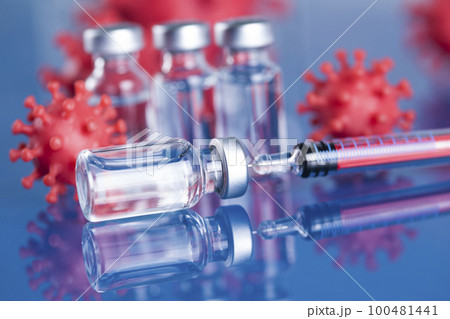 Close up medical syringe with a vaccine 100481441