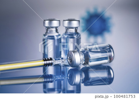 Close up medical syringe with a vaccine 100481753