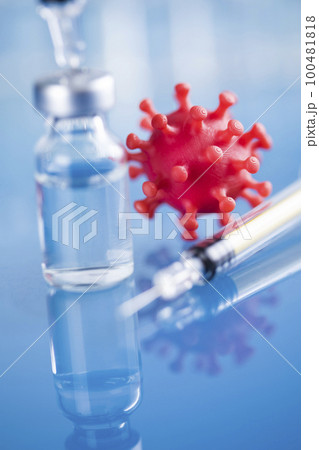 Close up medical syringe with a vaccine Close up medical syringe with a vaccine 100481818