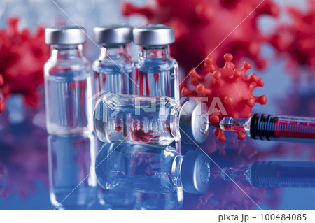 Close up medical syringe with a vaccine 100484085