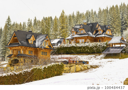 wooden houses in winter. Koscielisko Tatras, Poland 100484437