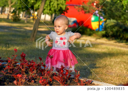 Charm girl child traveler exploring the surroundings discovering the world Charm girl child traveler exploring the surroundings discovering the world 100489835