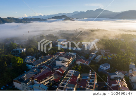 morning cloudy landscape with mist 100490547