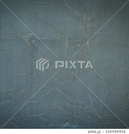 Gray and navy colored wall texture with rough cracks surface Gray and navy colored wall texture with rough cracks surface 100494956