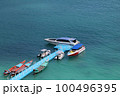 High angle shots of different ships It is docked at a Floating Piers on the beach on an island 100496395