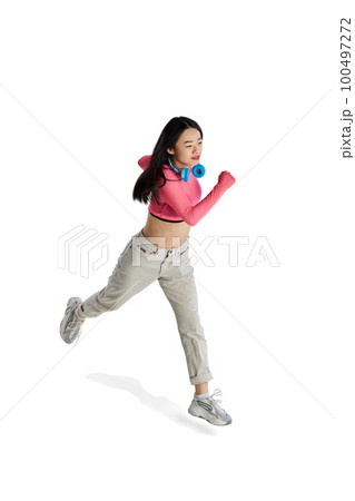 Top isometric view. Young girl with headphones in casual clothes in motion, running isolated over white background 100497272